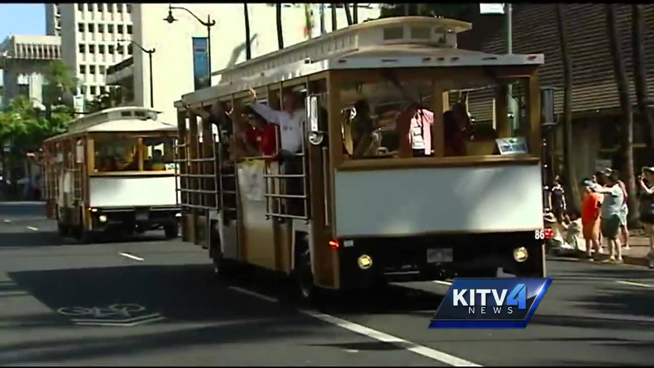 Lions Club members parade through Waikiki